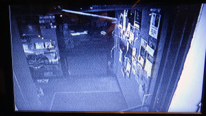 The KBOO front door seen through the security camera