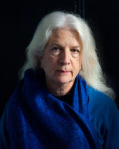 A photo of Martha Hennessy in a blue scarf