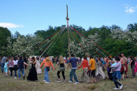 Beltane People dancing around the May Pole