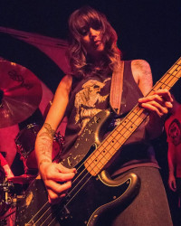Laura Phillips performs on stage with Hippie Death Cult kboo iwd hippie death cult laura phillips